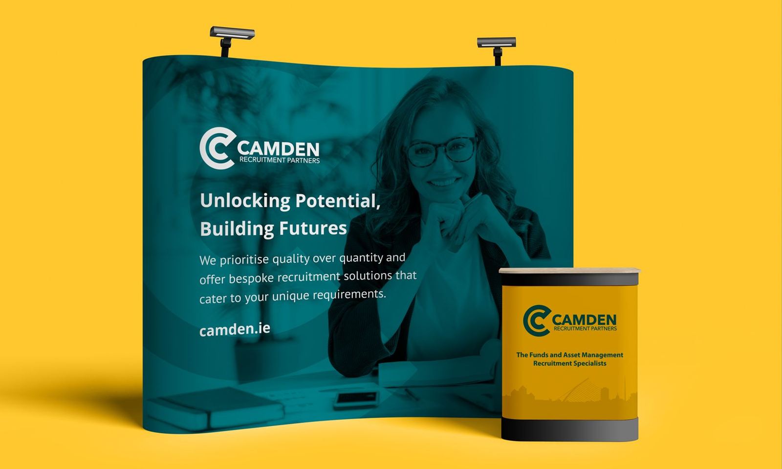 Camden Recruitment Partners exhibition stand and counter on a yellow background