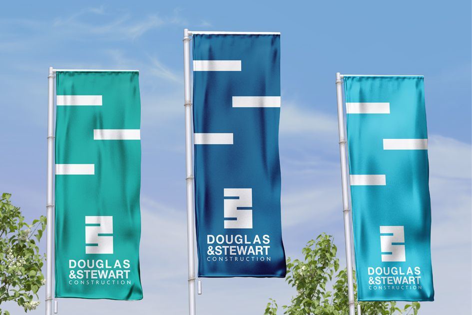 Douglas and Stewart flags against a blue sky