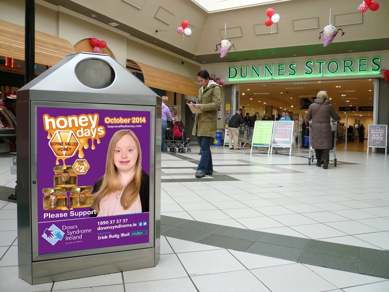 Honey Days poster for Down Syndrome Ireland in a shopping centre display