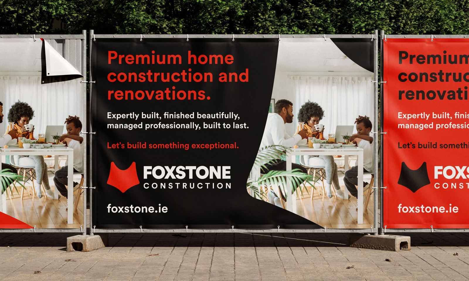 Foxstone Construction site hoarding with photography and the fox mark