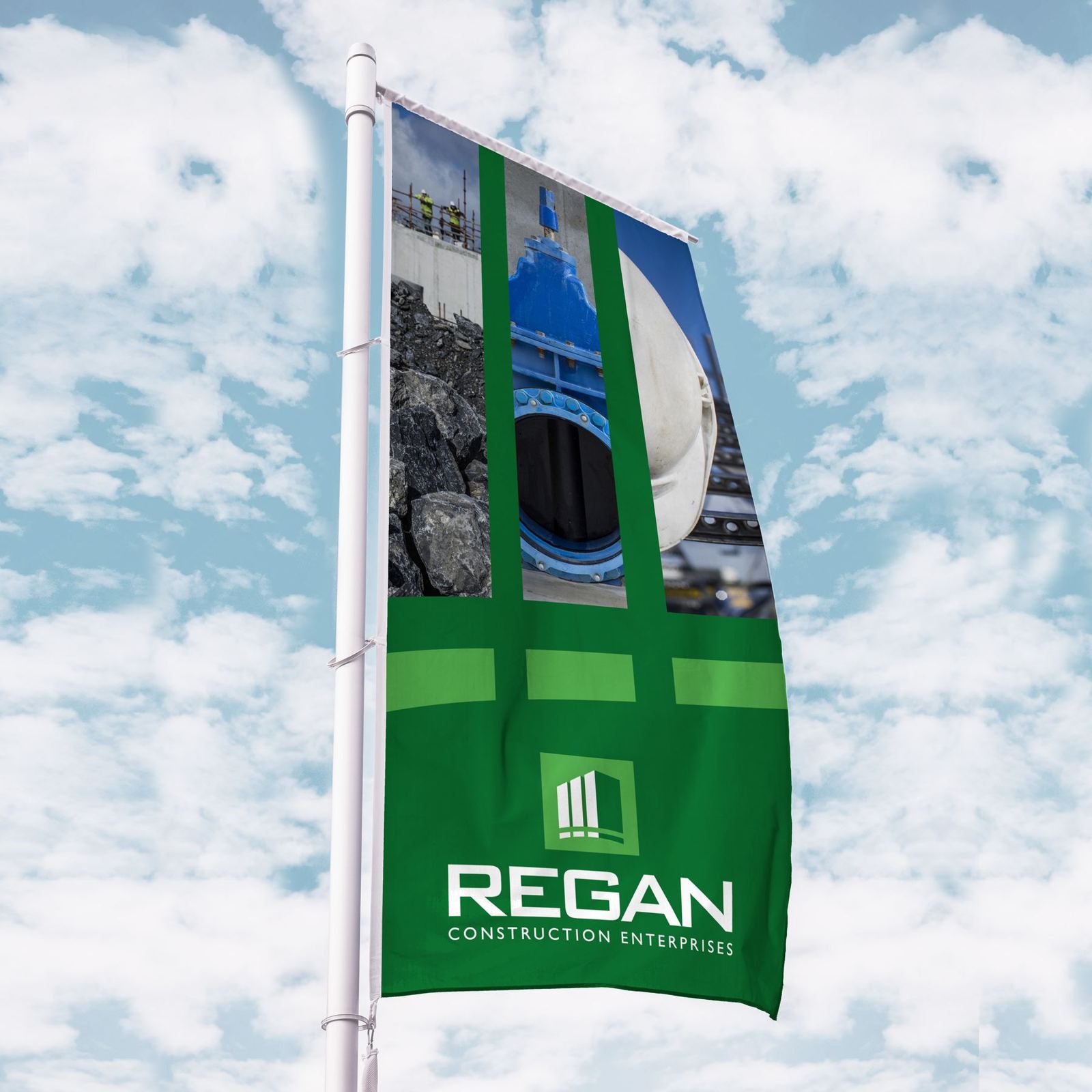 Regan Construction flag against a cloudy sky
