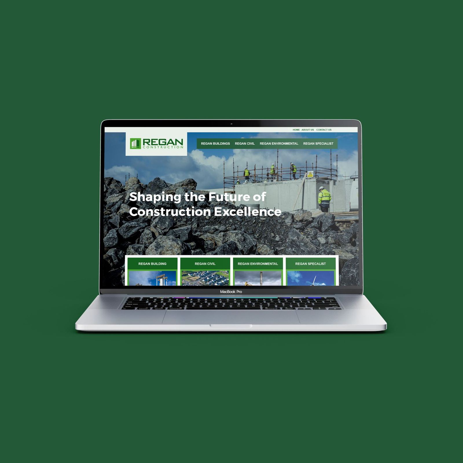 Regan Construction website on a laptop