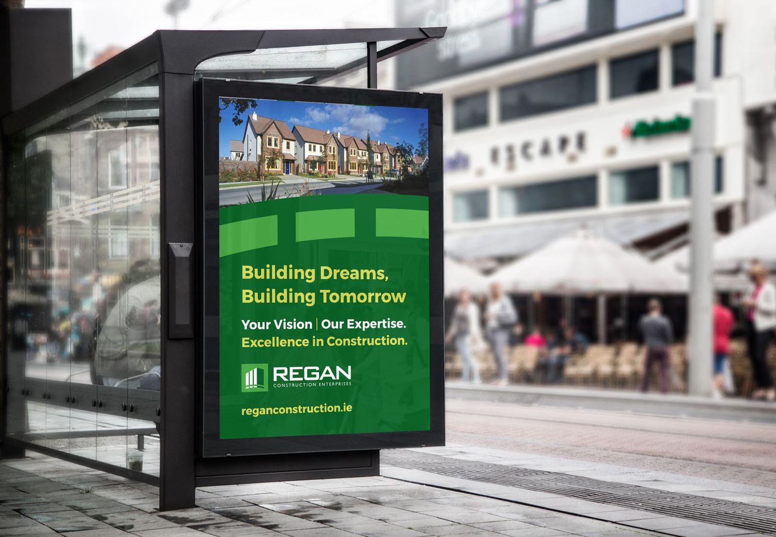 Regan Construction poster in a city bus shelter