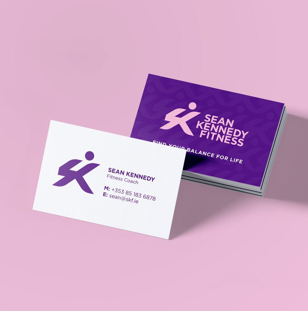 Sean Kennedy Fitness business cards in purple and white