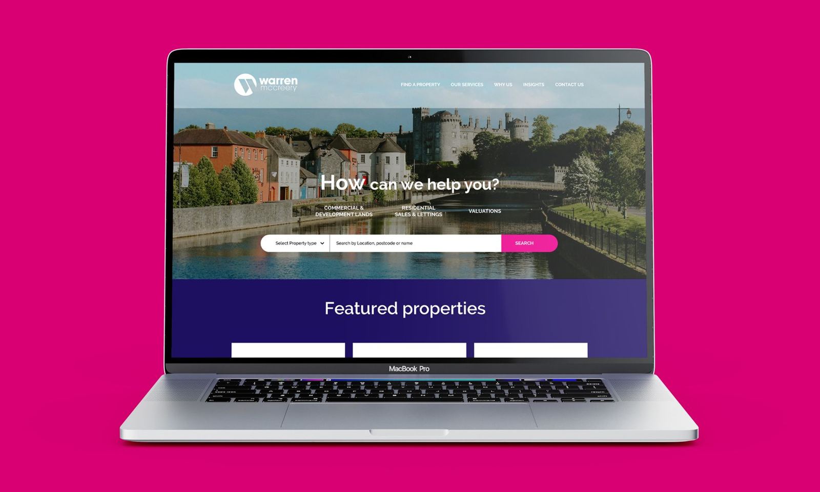 Warren McCreery website on a laptop, with a property search and featured properties